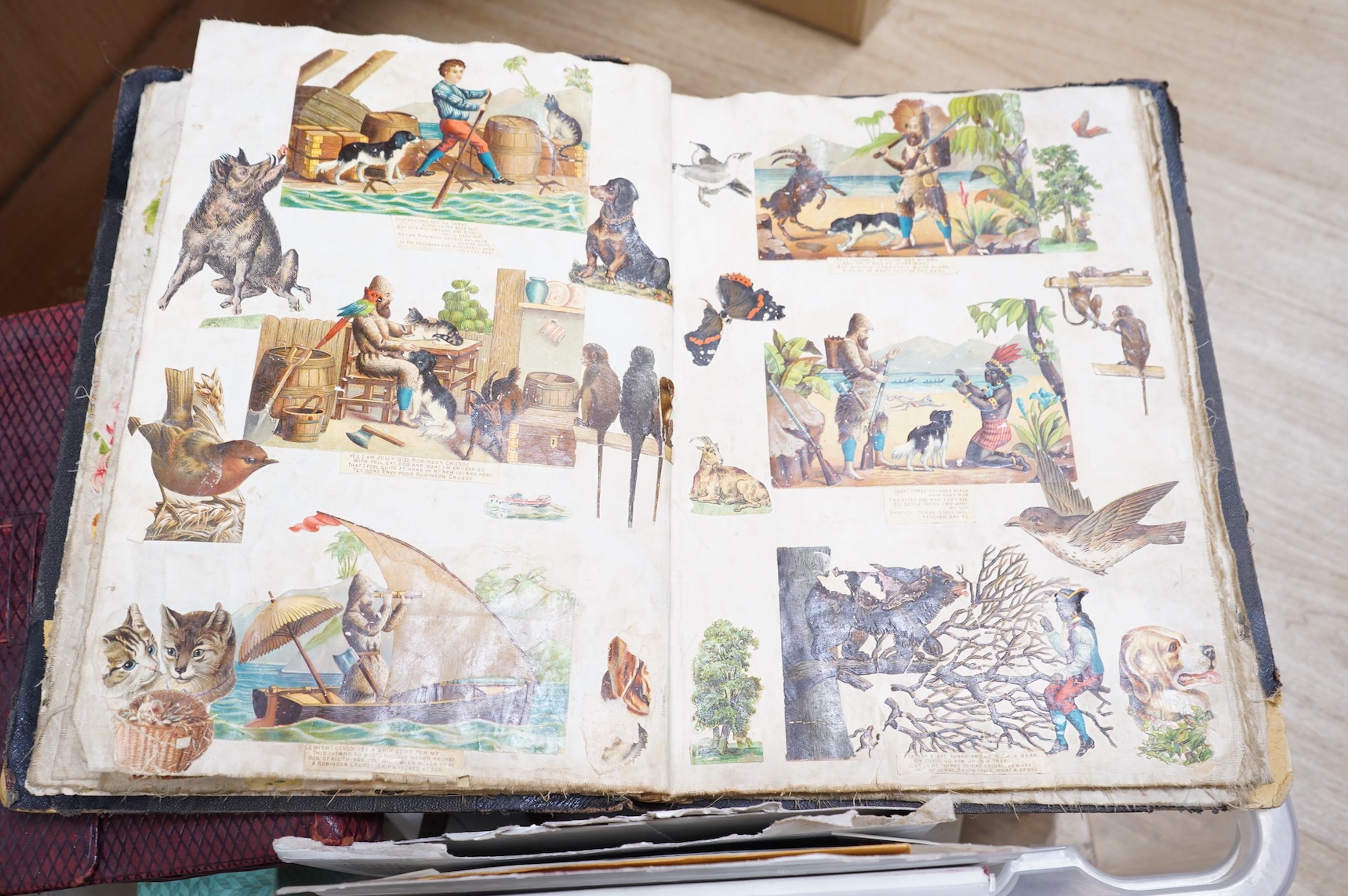A collection of sundry items to include a scrapbook and a large collection of various stamps